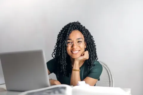 Virtual assistant working at her laptop
